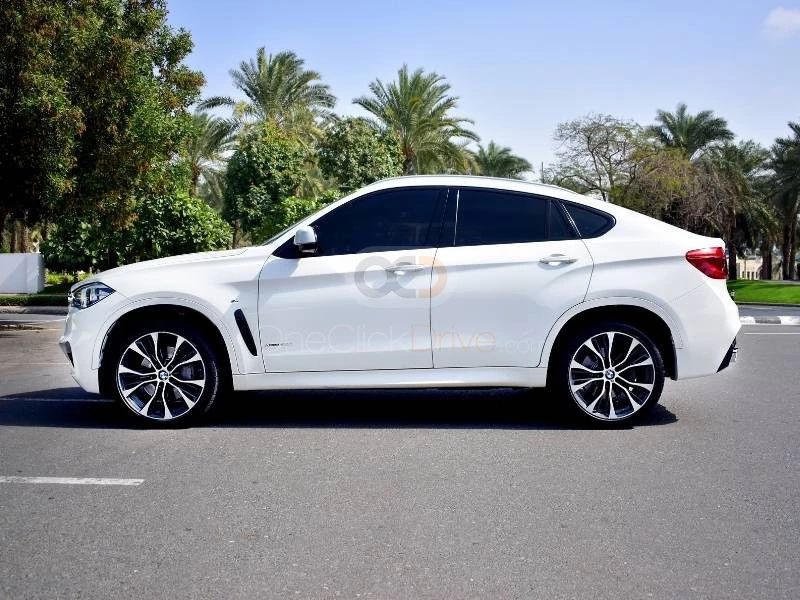 White BMW X6 M50i 2018 for rent in Dubai 8